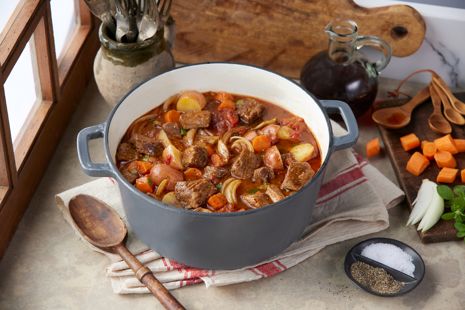 Tomato Beef Stew in a pot on a table