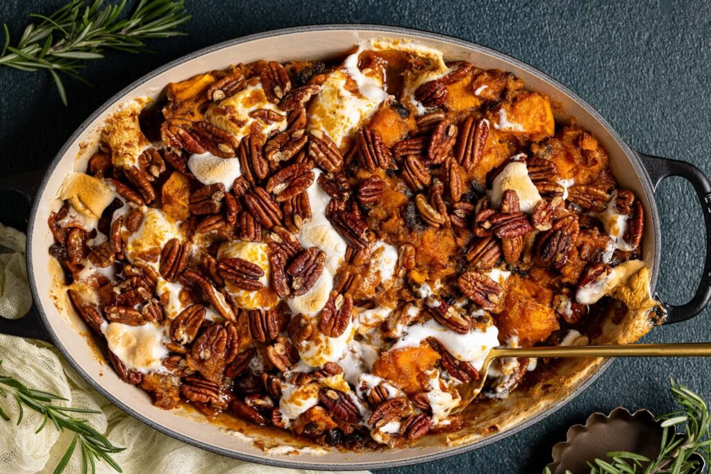 Delicious Sweet Potatoes Casserole with walnuts and marshmallows 