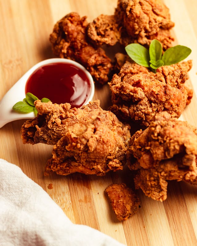 Crispy chicken strips with tomato sauce dip