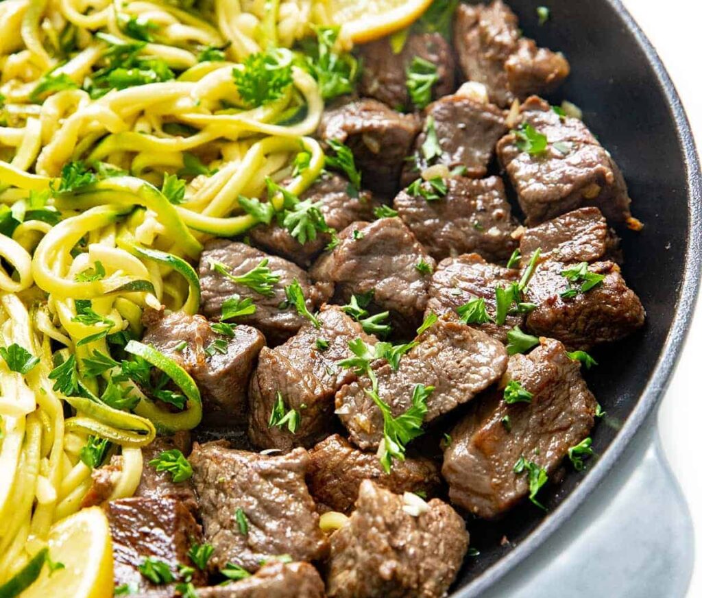 easy garlic butter beef chunks with noodles 