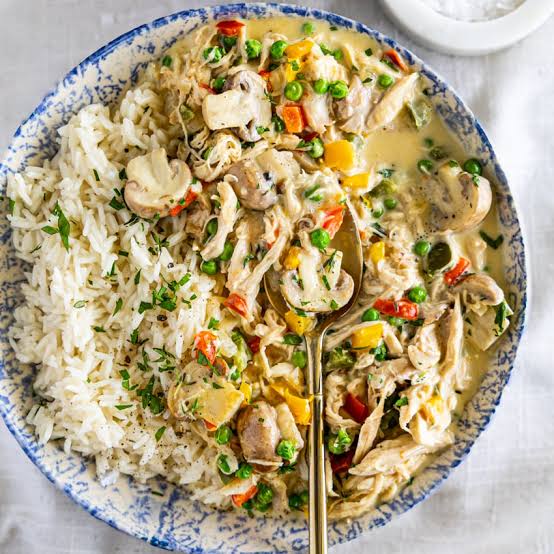 Easy homemade chicken Ala king served with rice. 